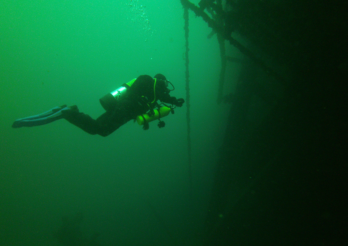 Amy Fraley diving to a shipwreck next to the Cedarville in the Great Lakes