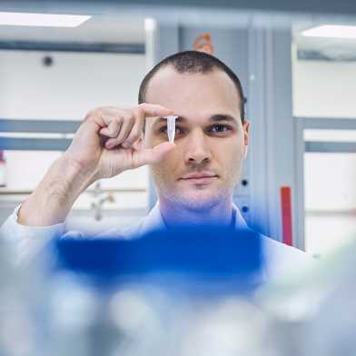 Giuseppe Antoniazzi holding an Eppendorf tube